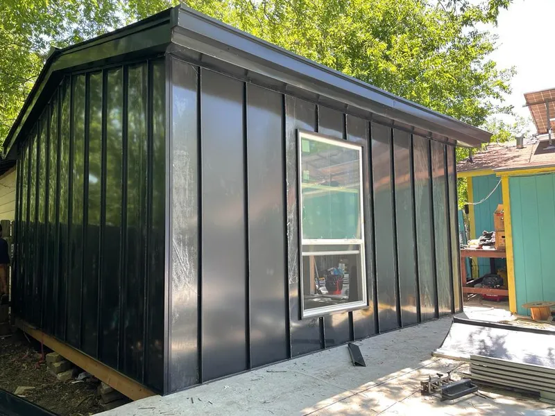 Black standing seam metal wall panels for Roof Inspection in Helena