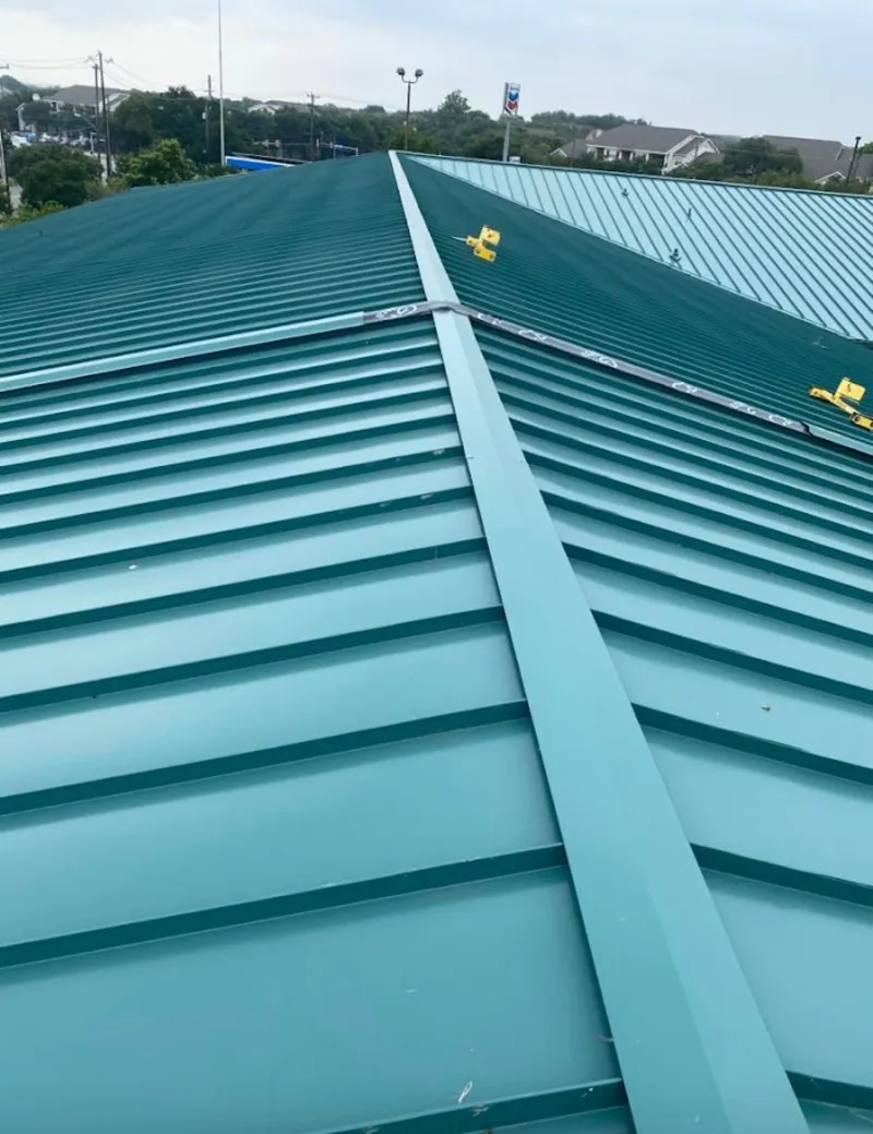 Green commercial metal roof ridge and valley for Metal Roof Repair in Helena